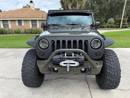 Green 2016 Jeep Wrangler Unlimited Sport