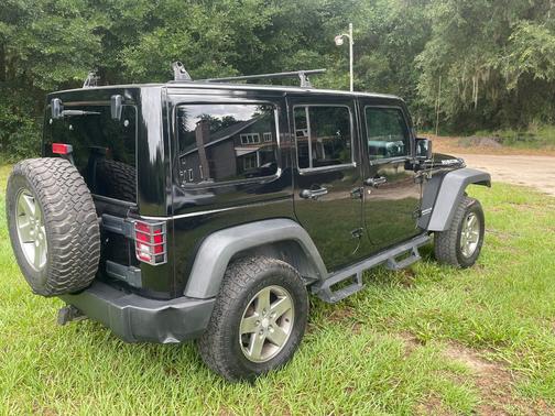 Black 2012 Jeep Wrangler Unlimited Rubicon