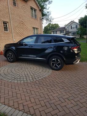 Black 2023 Kia Sportage Hybrid LX