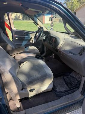 Black 2000 Ford F-150 XLT Flareside