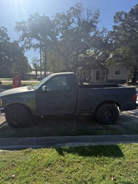 Black 2000 Ford F-150 XLT Flareside