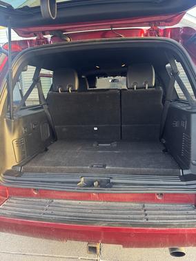 Red 2015 Ford Expedition EL XLT