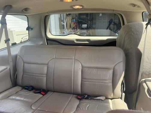 Red 2001 Ford Excursion Limited