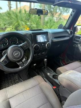 Red 2011 Jeep Wrangler Sport