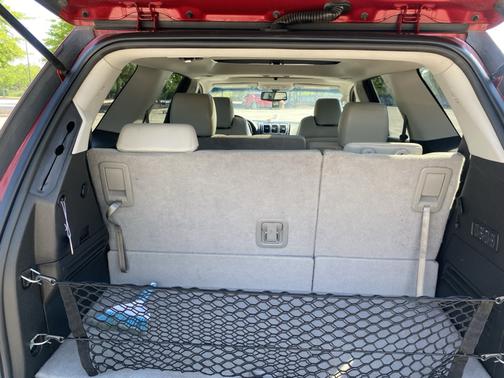 Red 2012 GMC Acadia Denali