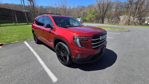 Red 2024 GMC Acadia Elevation