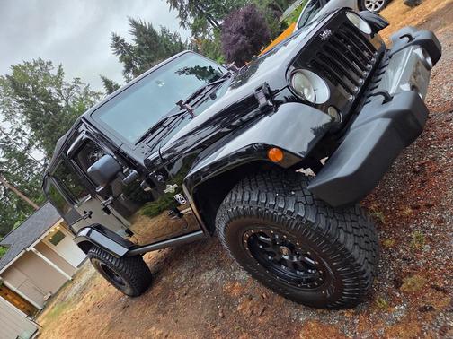 Black 2014 Jeep Wrangler Unlimited Freedom Edition
