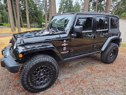 Black 2014 Jeep Wrangler Unlimited Freedom Edition