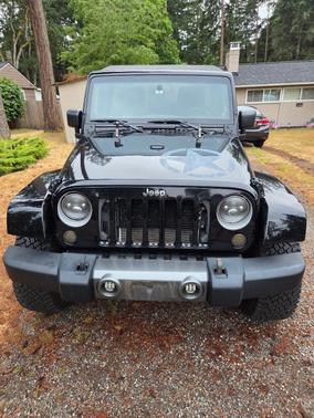 Black 2014 Jeep Wrangler Unlimited Freedom Edition