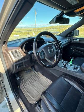 Gold 2014 Jeep Grand Cherokee Summit