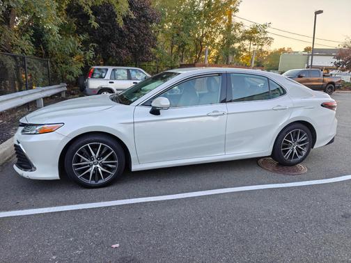 White 2022 Toyota Camry Hybrid XLE