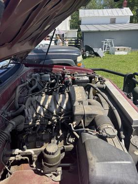 Red 2000 Toyota Tundra SR5 Access Cab
