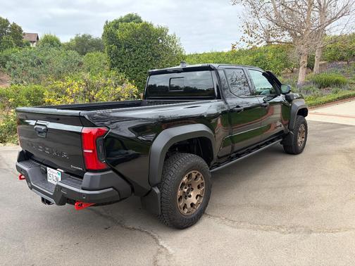 Black 2026 Toyota Tacoma Hybrid Trailhunter