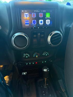 Silver 2015 Jeep Wrangler Sahara