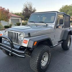 Gray 2001 Jeep Wrangler SE
