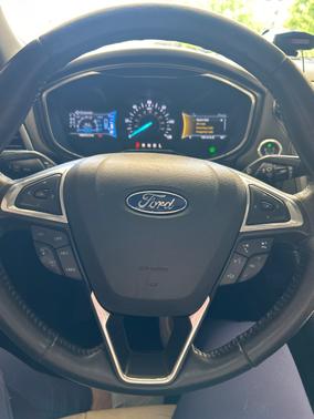 White 2016 Ford Fusion Hybrid Titanium