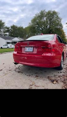 Red 2006 BMW 325 xi