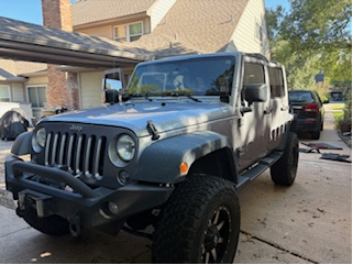 Gray 2014 Jeep Wrangler Unlimited Sport