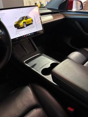 Red 2023 Tesla Model Y Long Range