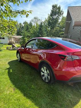 Red 2023 Tesla Model Y Long Range