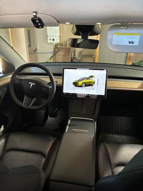 Red 2023 Tesla Model Y Long Range