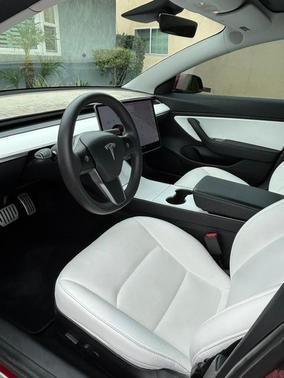 Red 2019 Tesla Model 3 Standard Range Plus