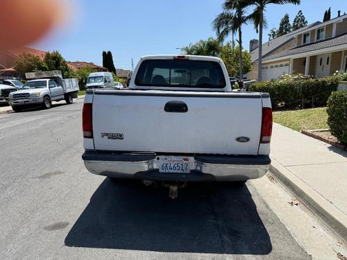 White 2000 Ford F-250 XLT SuperCab Super Duty