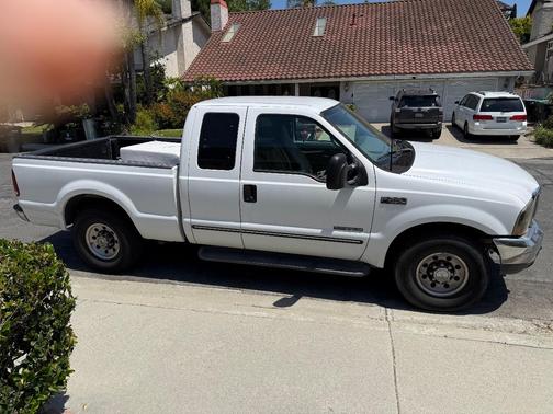White 2000 Ford F-250 XLT SuperCab Super Duty