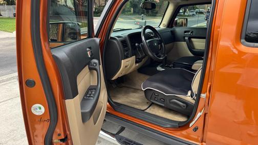Orange 2007 Hummer H3 Base