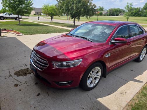 Red 2016 Ford Taurus SEL