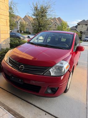 Red 2012 Nissan Versa 1.8 S