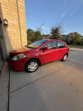 Red 2012 Nissan Versa 1.8 S