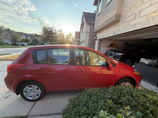 Red 2012 Nissan Versa 1.8 S