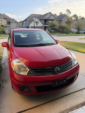 Red 2012 Nissan Versa 1.8 S