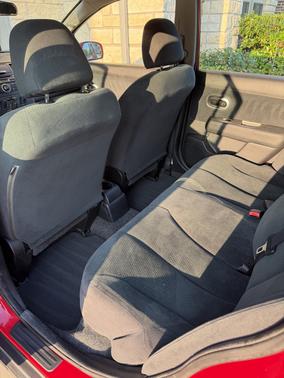 Red 2012 Nissan Versa 1.8 S
