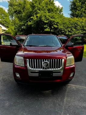Red 2010 Mercury Mariner Base