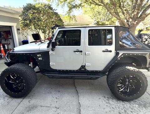 Silver 2009 Jeep Wrangler Unlimited X
