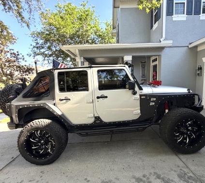 Silver 2009 Jeep Wrangler Unlimited X