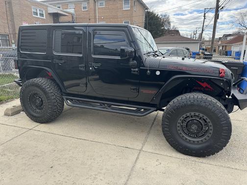Black 2013 Jeep Wrangler Unlimited Rubicon
