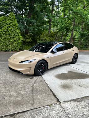 Beige 2024 Tesla Model 3 Performance
