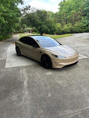 Beige 2024 Tesla Model 3 Performance