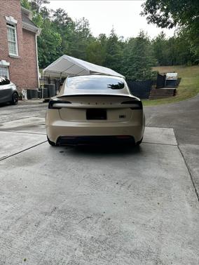 Beige 2024 Tesla Model 3 Performance