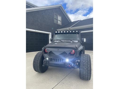 Photo 2 of 9 of 2013 Jeep Wrangler Unlimited Freedom Edition