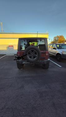 Red 2008 Jeep Wrangler Unlimited Sahara