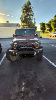 Red 2008 Jeep Wrangler Unlimited Sahara