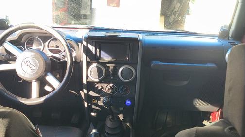 Red 2008 Jeep Wrangler Unlimited Sahara