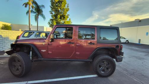 Red 2008 Jeep Wrangler Unlimited Sahara