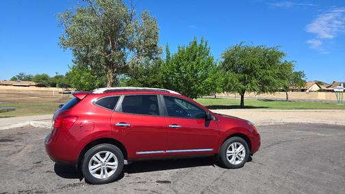 Red 2015 Nissan Rogue Select S