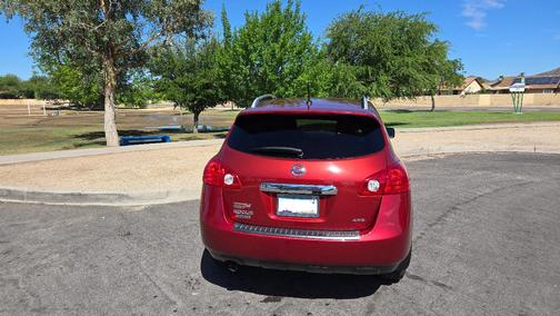 Red 2015 Nissan Rogue Select S