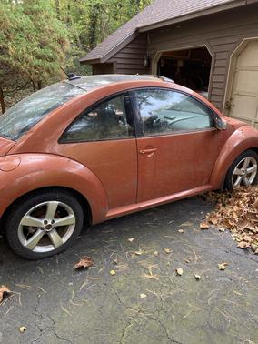 Orange 2010 Volkswagen New Beetle Red Rock Edition